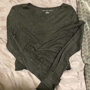 American Eagle black long sleeve with white speckle details.